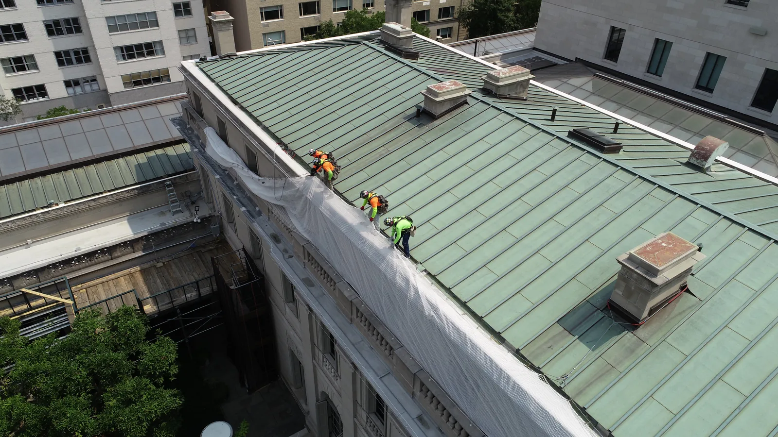 Close aerial roof-inspection frame over a landmark museum building