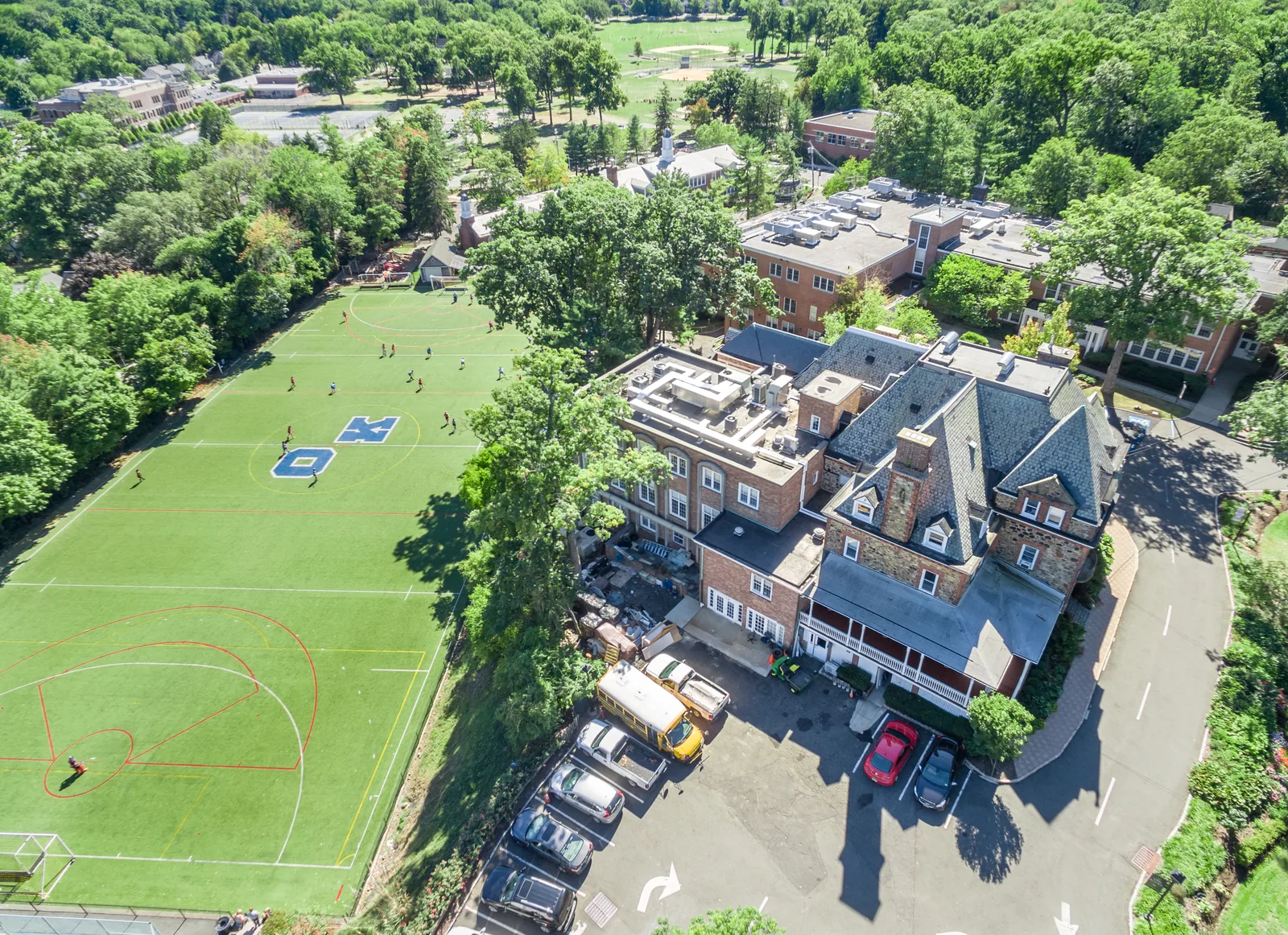 Oak Knoll School campus in Summit, NJ: main building, athletic fields, and courts from the air