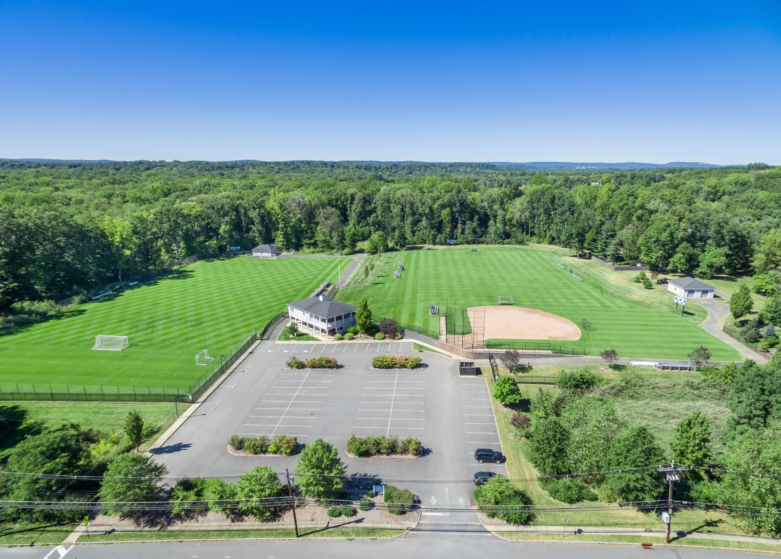 Athletic fields and campus building from the air in Summit, NJ