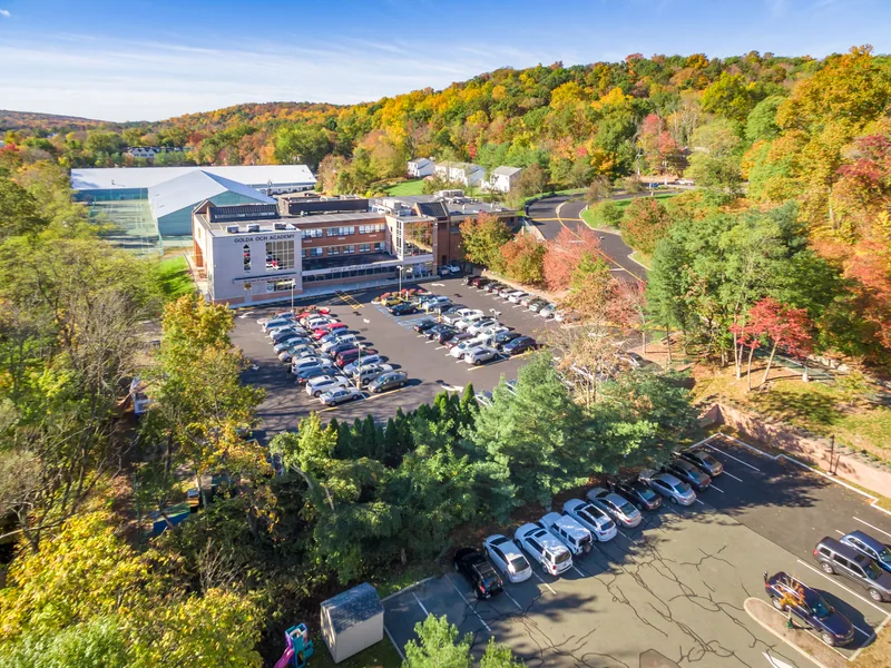 Private school campus in West Orange, NJ, photographed from the air in peak fall color