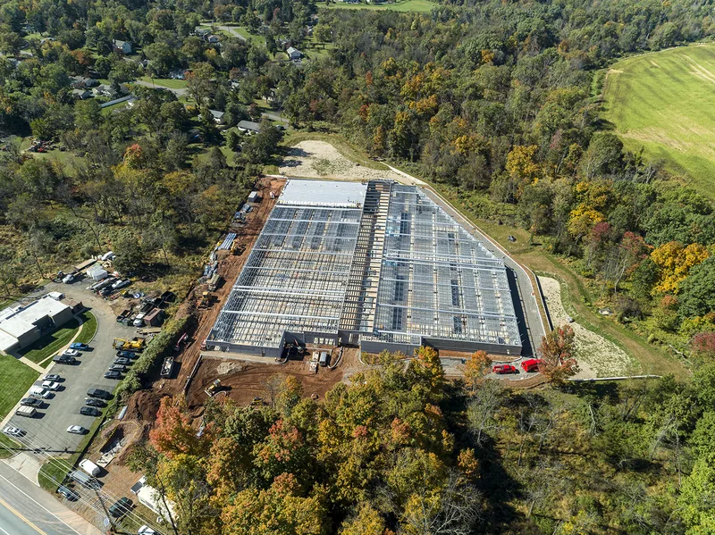 Site progress aerial, Hillsborough, NJ — building, drives, and grading in one frame