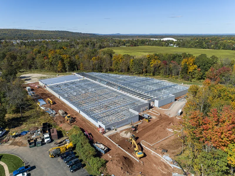 Steel and roof structure progress frame from a recurring NJ construction program